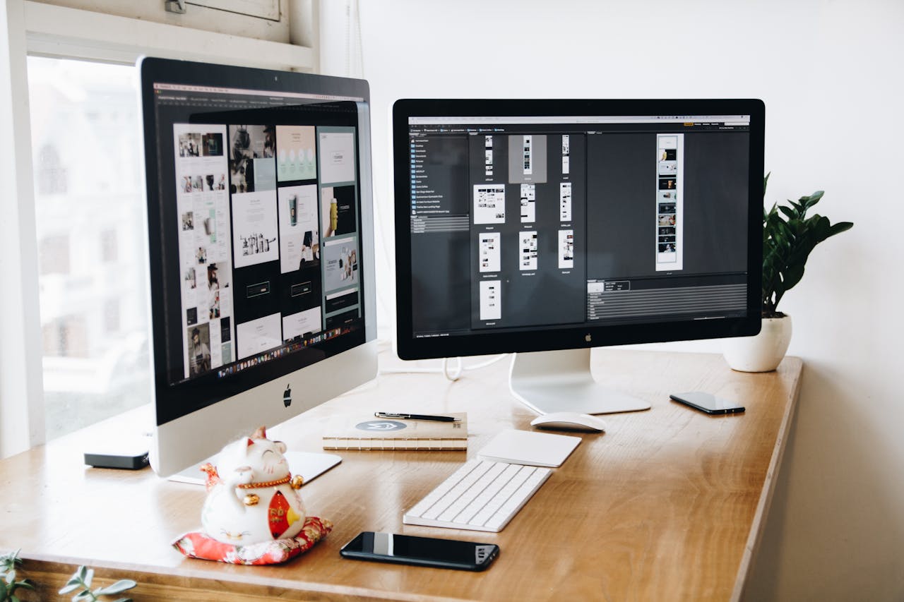 A well-organized design workspace with dual monitors for good first impression.